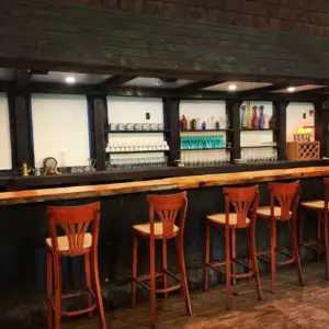Rustic event venue in Charlton Massachusetts with a full tavern, bar, cabins, expansive forest, hiking trails, and beautiful natural surroundings at Ye Olde Commons